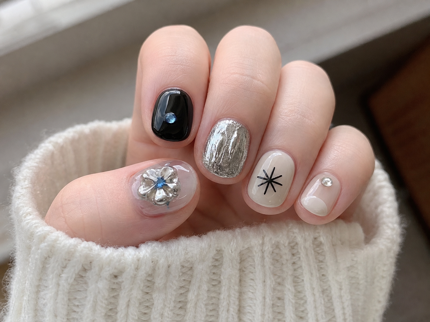 Glossy Black And Nude Round Nail Design