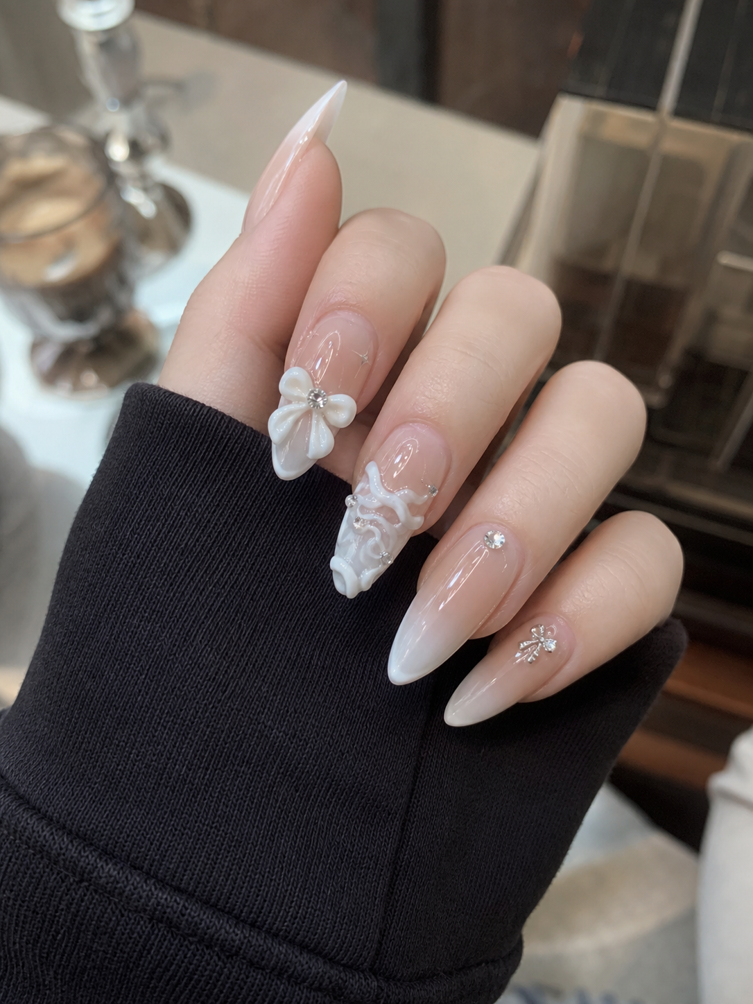 Glossy Sheer Nude And White Almond Nail Design