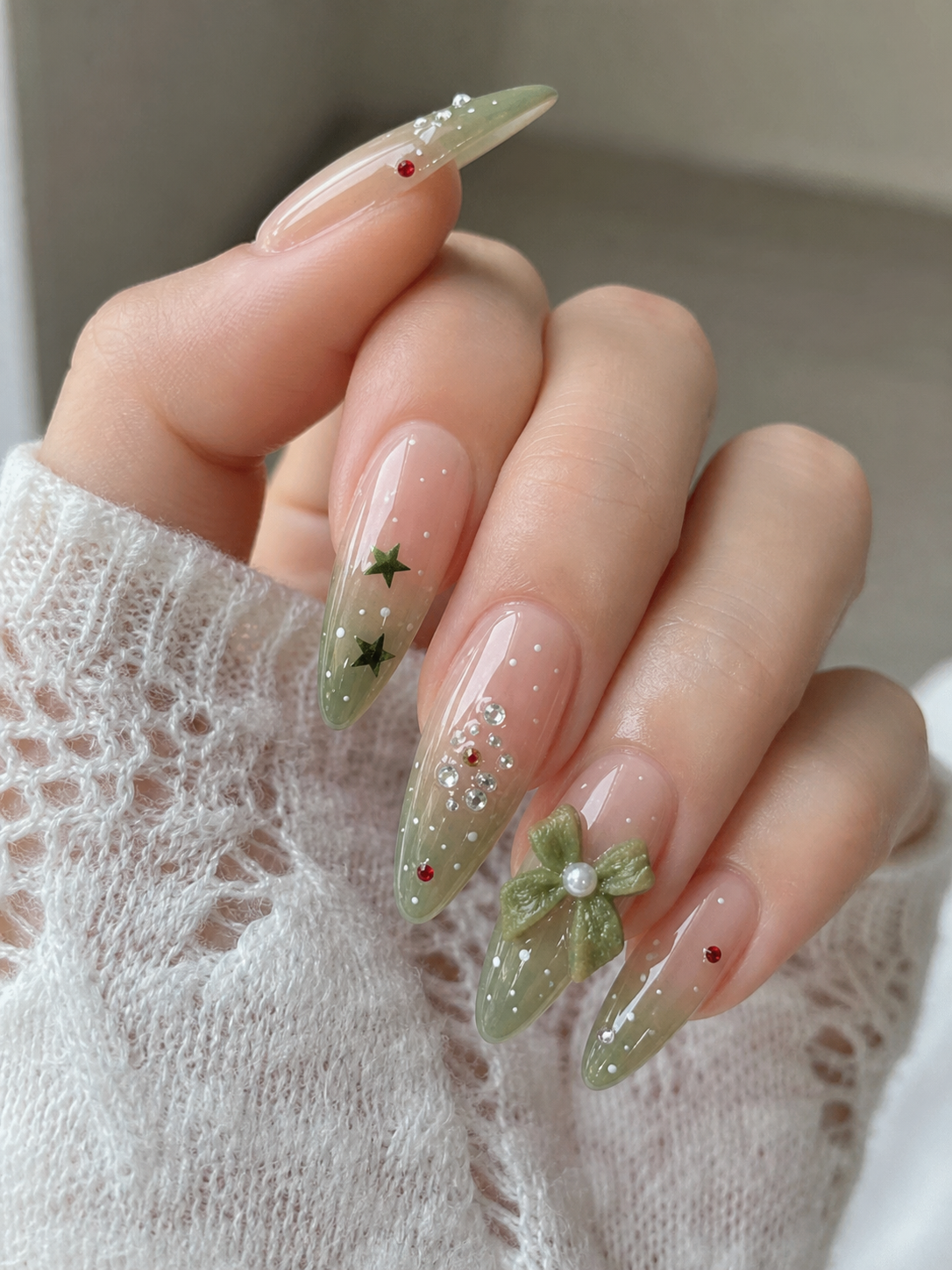 Glossy Sheer Nude And Green Almond Nail Design