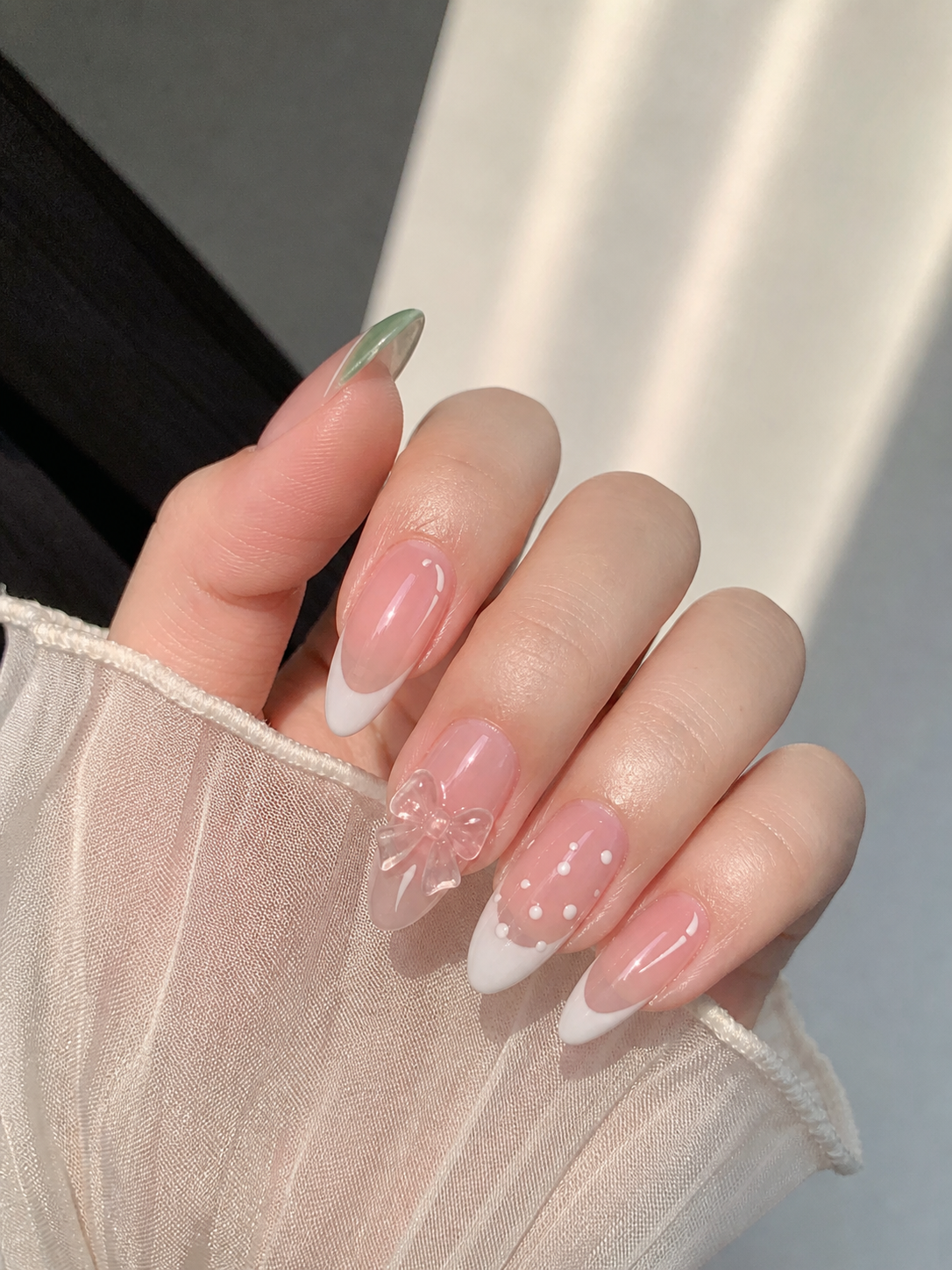Glossy Pink And White Almond Nail Design