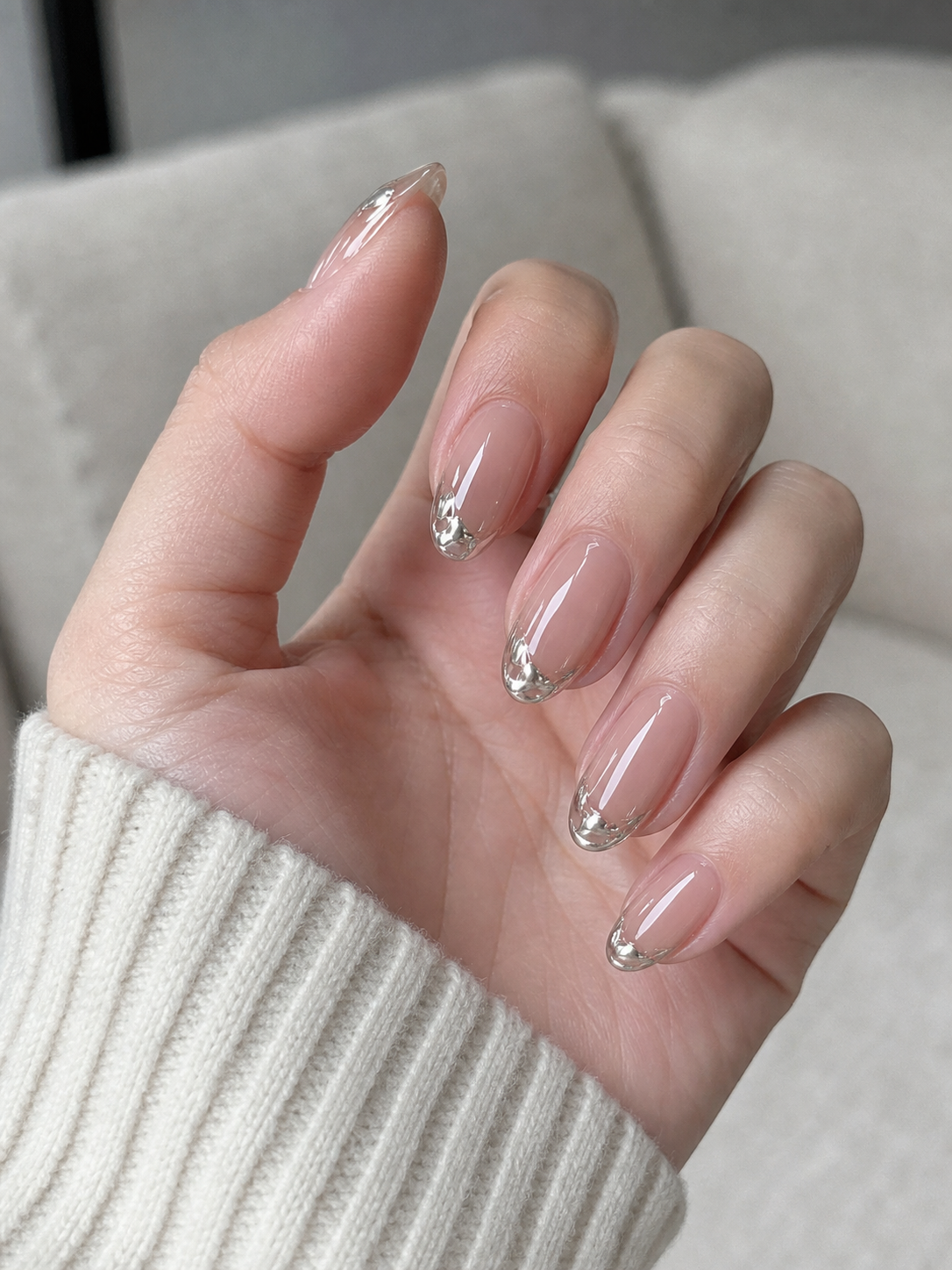 Glossy Sheer Nude And Silver Oval Nail Design