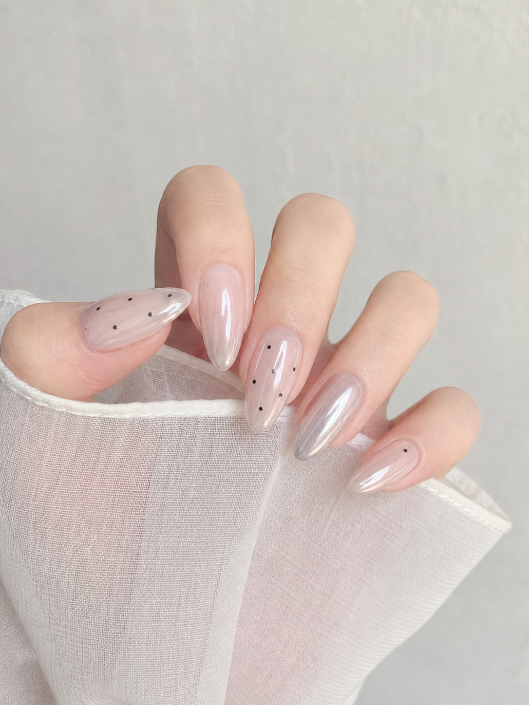 Glossy White And Silver Almond Nail Design