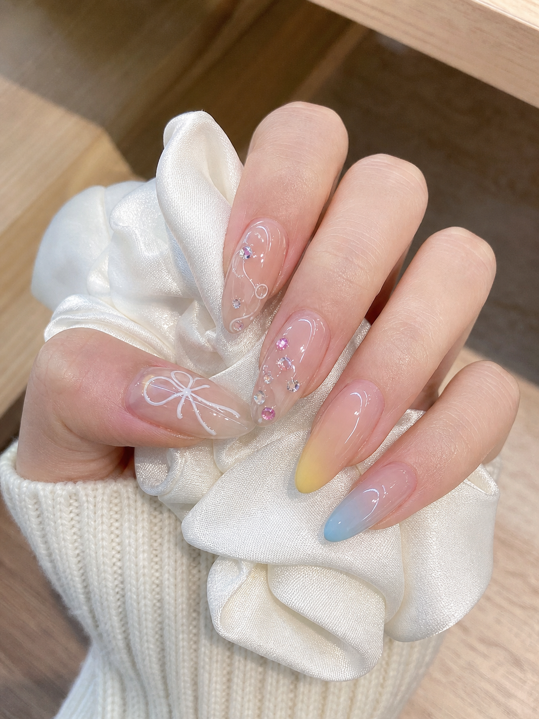 Glossy Nude And White Oval Nail Design