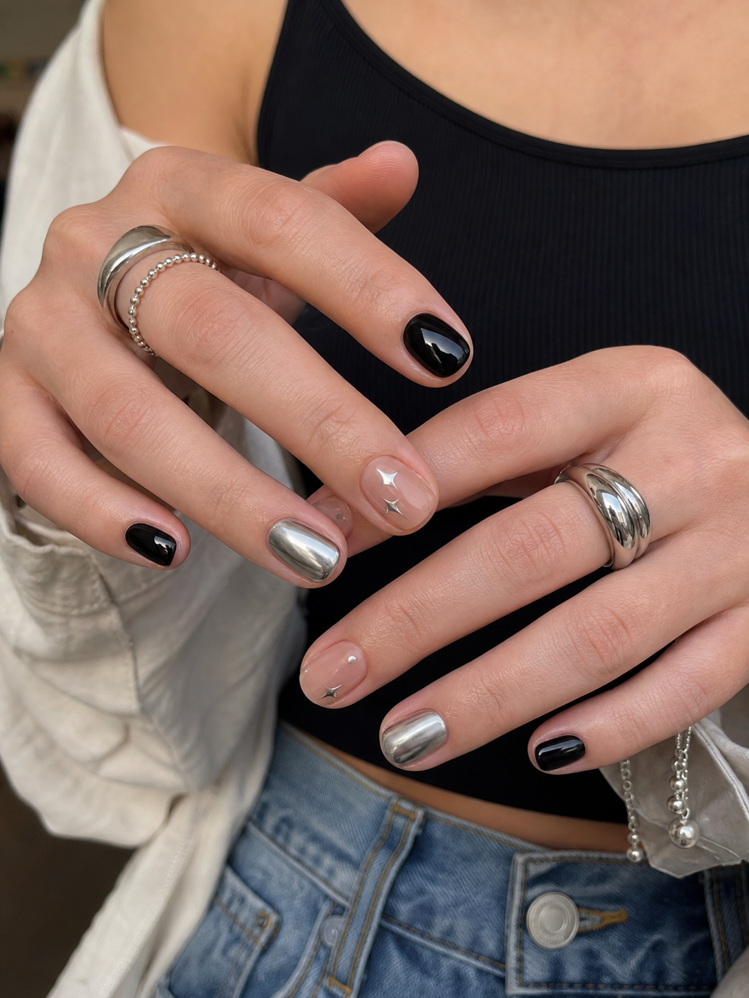 Glossy Black And Sheer Nude Round Nail Design
