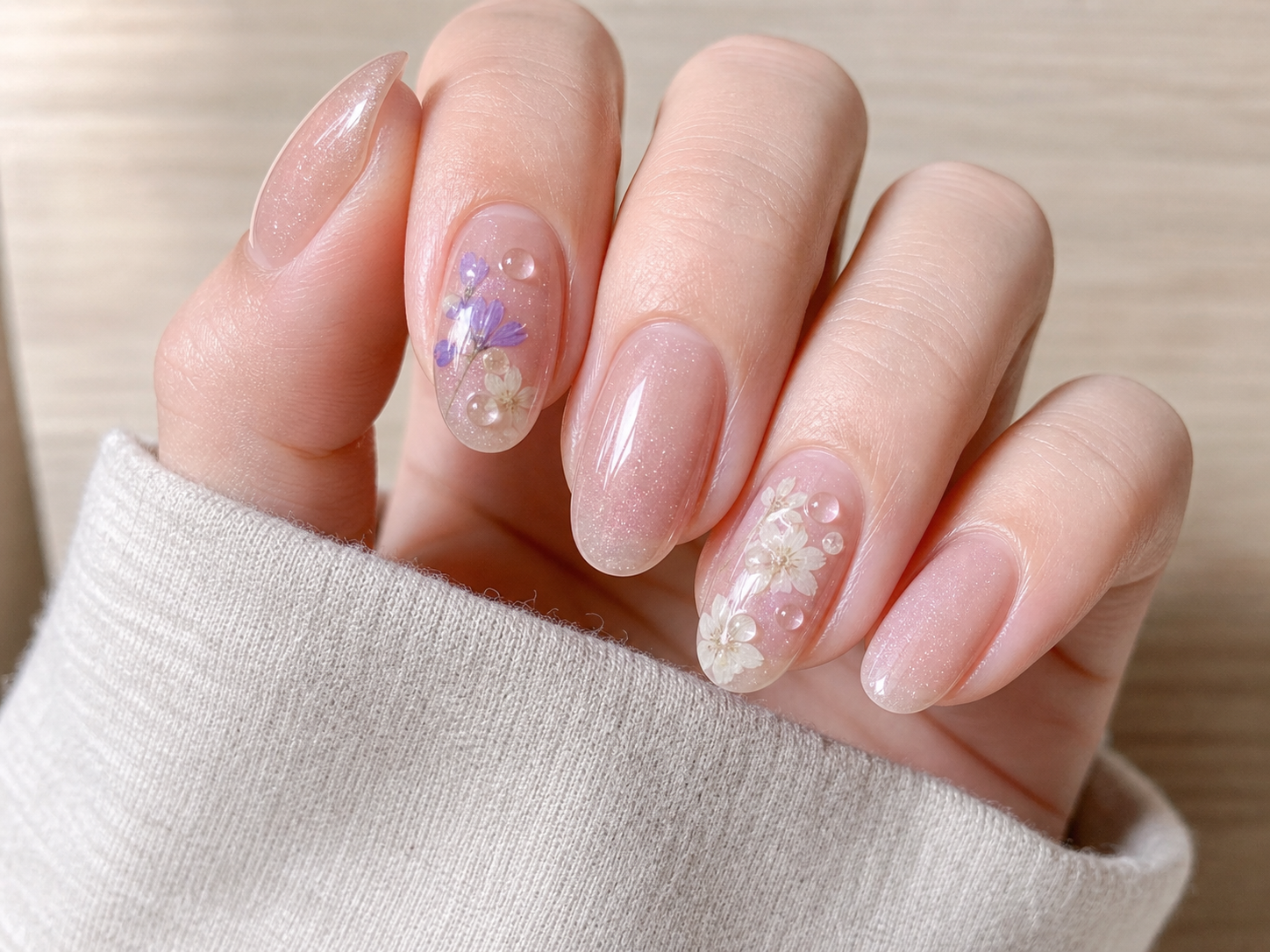 Glossy Nude And Pink Oval Nail Design