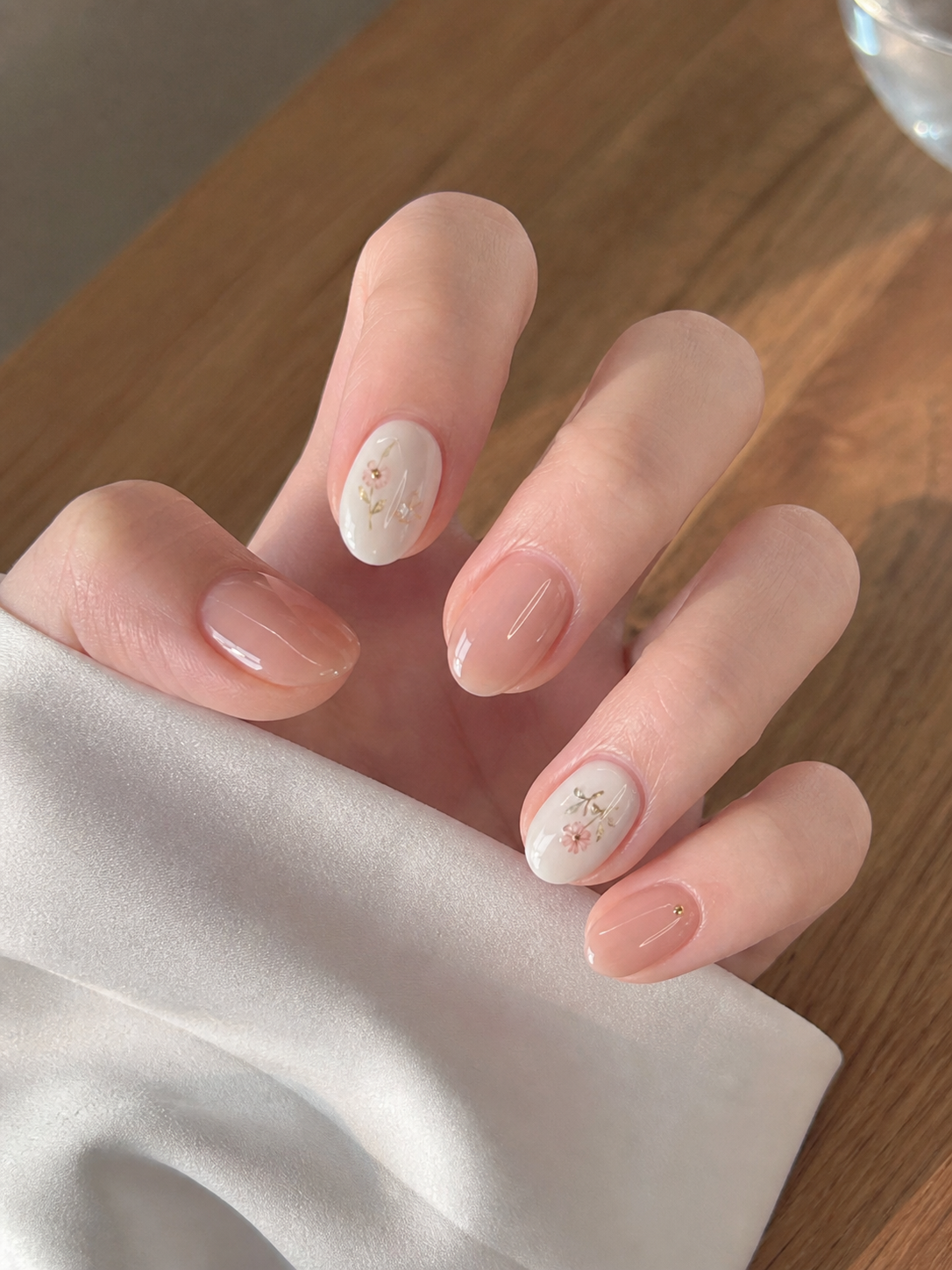 Glossy Sheer Nude And White Oval Nail Design